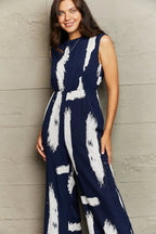 Perfee Printed Round Neck Cutout Jumpsuit with Pockets - Charmdeals