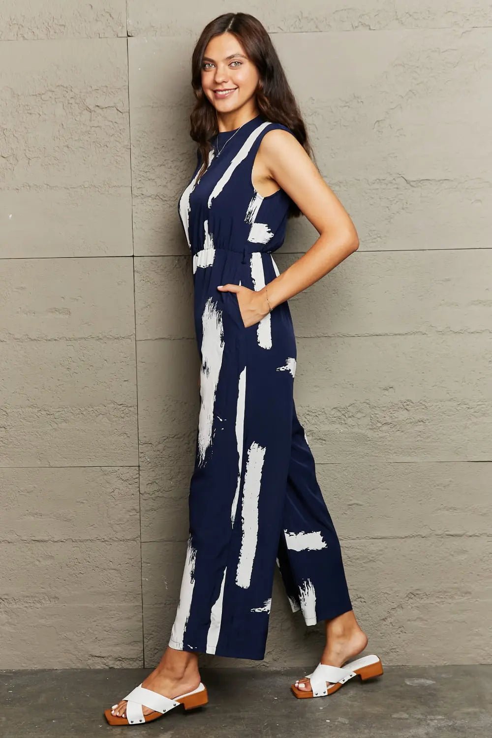Perfee Printed Round Neck Cutout Jumpsuit with Pockets - Charmdeals